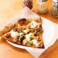 Fungo Pizza · Local oyster mushrooms, beurre blanc sauce, basil, fresh mozzarella and caramelized onions.