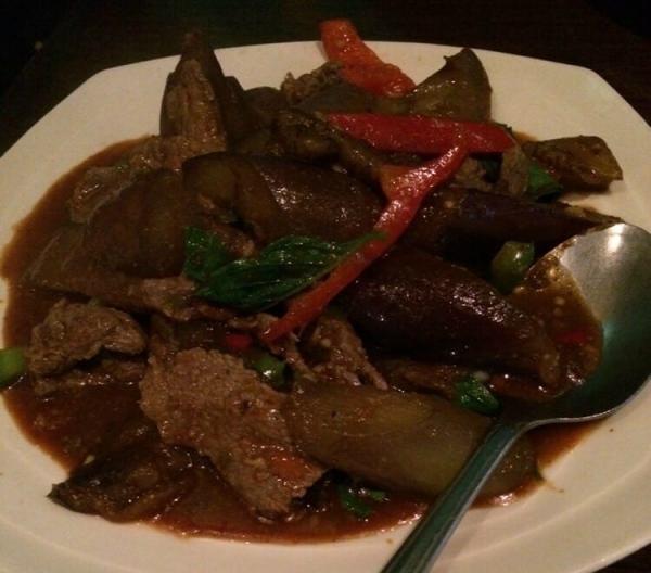 44. Spicy Eggplant · Meat stir - fried with Chinese eggplant, sweet basil, and bell pepper in red curry sauce.