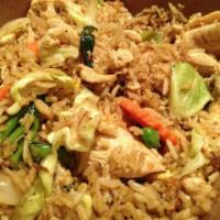 62. Yellow Curry Fried Rice · Stir-fried rice plus egg, yellow curry powder, green peas, onion, carrots, and cabbage.