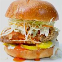 Hot Gochujang  Chicken Sandwich · Crispy chicken breast fillet,  hot gochujang sauce, pickled jalapeños, cabbage slaw, Cajun a...