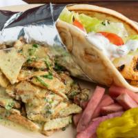 15. Chicken Kabob Wrap · All white chicken breast, garlic paste, lettuce, tomato and house dressing. Served with pick...