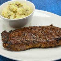 Certified Angus Beef New York Strip · Gluten-sensitive. 12 oz, served with choice of side.