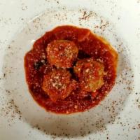 Polpettine al Pomodoro · Veal meatballs, tomato sauce and Parmigiano Reggiano.