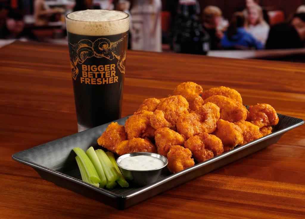 Crispy Cauliflower · Your style choice of Buffalo, RAM BBQ, Honey-Sriracha, or naked. Served with ranch or blue cheese. 