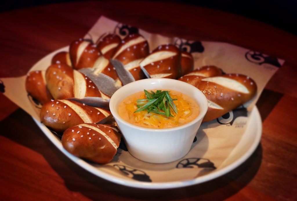 Pretzel and Beer Cheese Fondue · Warm authentic Bavarian pretzel sticks, Buttface Amber Ale beer cheese fondue. Add 3 pretzels for an additional charge.