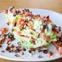 The Wedge Salad · Grilled or Blackened Chicken, iceberg, blue cheese dressing, tomato, bacon, crumbled blue ch...