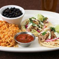 Ram Tacos · Pickled red onion, cilantro crema, chipotle-tarragon slaw with red rice, black beans, salsa,...