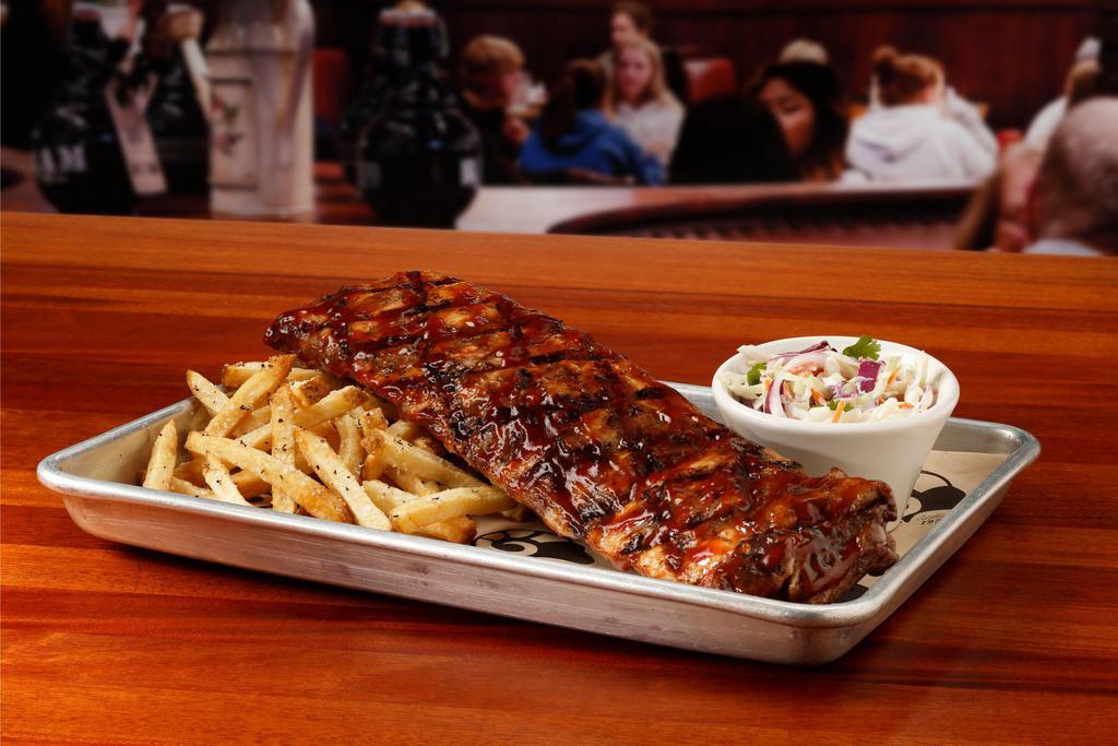 Big Reds IPA Baby Back Ribs · Slow-braised in BIG RED’S IPA & spices finished with
Ram tangy bbq sauce, served with zesty coleslaw & fries.