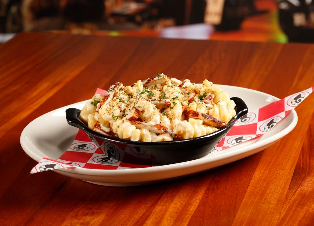 Multiple Choice Mac and Cheese · Cavatappi elbow pasta, rich, creamy cheddar cheese sauce and gratine. Extras are available for an additional charge.