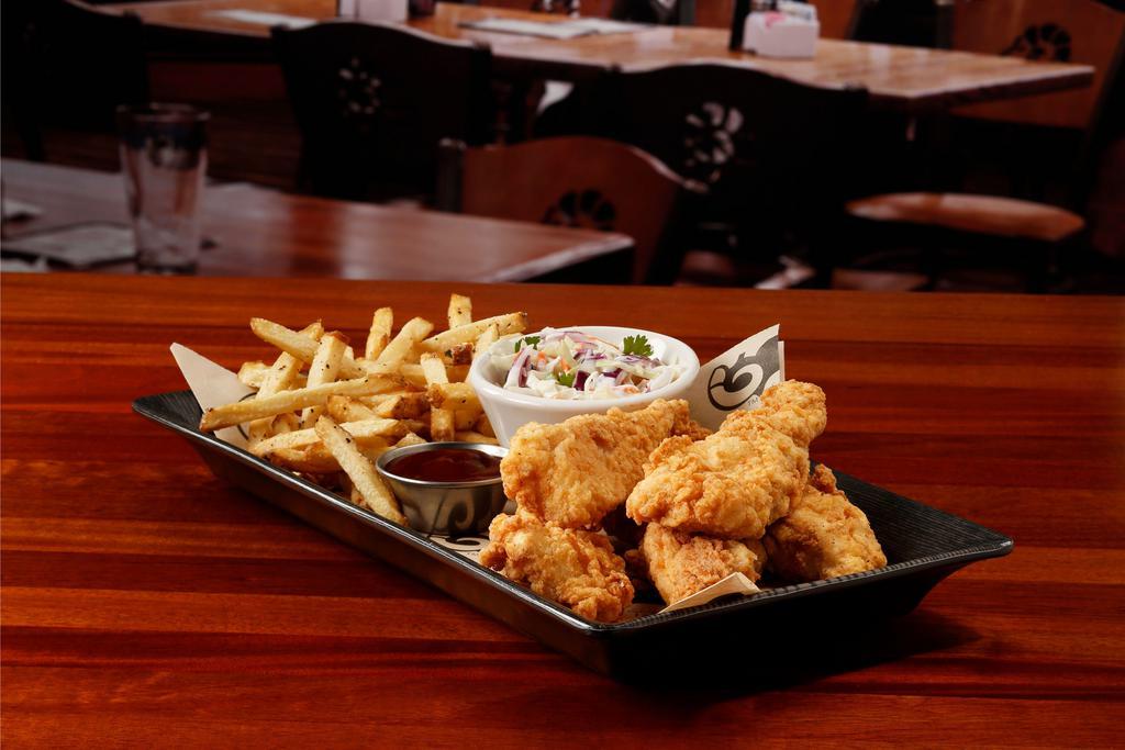 Crispy Chicken Strips · Cooked golden, fries and zesty coleslaw. Comes with a choice of sauce.
