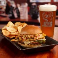 Sergeant Pepper Burger · Southwest seasoned, smoked Anaheim pepper, Buttface Amber Ale cheese sauce, fried jalapeno s...