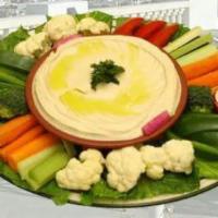 Hommous with Raw Vegetables · Vegan and gluten free. A generous mix of fresh vegetables with our hommous.