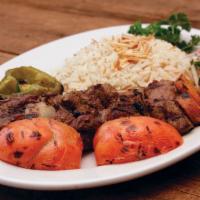 Meat Shawarma Plate · Gluten free. Marinated, slow-roasted and shaved off a rotisserie skewer. Served with choice ...