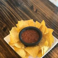 chips + salsa · Freshly made corn tortilla chips served with homemade warm salsa.