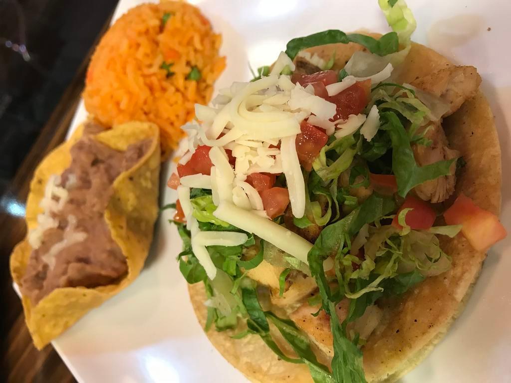 Kid's 1 Taco Plate · With your choice of meat. Served with rice and beans or french fries and a small drink.