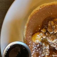 Banana Nut Pancakes · caramelized bananas, toasted walnuts, maple syrup