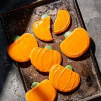 Pumpkin Cookie 6-pack · 450 Cal. A six pack of freshly baked, pumpkin-shaped shortbread cookies decorated with icing...
