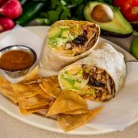 Veggie Burrito · Includes rice, beans, cheese, lettuce, red sauce, and sour cream.