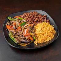 Bistec a la Mexicana Platillo · Grilled chopped tender steak, sauteed with onions, tomatoes and jalapeno peppers. Served wit...