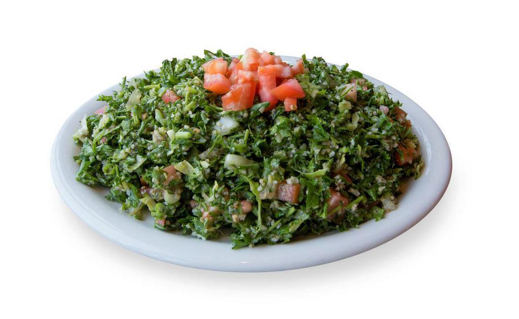 Small Tabbouleh Salad · Chopped Parsley , Tomato , onions , crushed wheat and Tabbouleh Dressing 