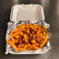 Loaded Crinkle Cut Fries · Golden crinkle cut french fries fried crisp then loaded with crispy bacon and cheese, served...