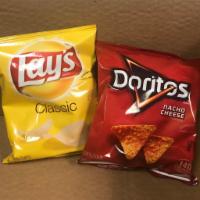 Chips · A bag of either regular Lay's or nacho cheese Doritos