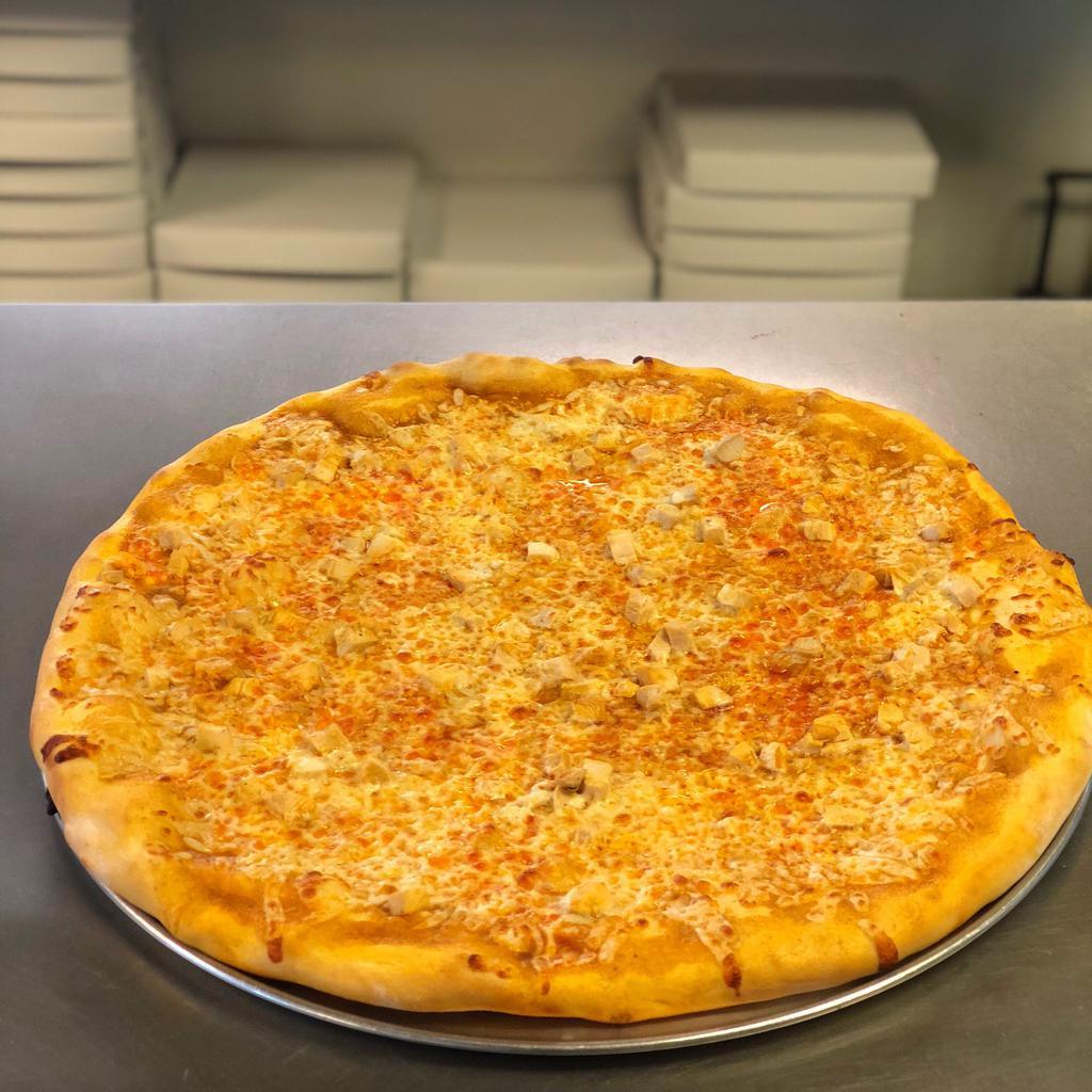 Buffalo Chicken Wing Pizza · Our Buffalo Chicken Wing Pizza! Definitely a crowd pleaser. We start with our house made medium Buffalo sauce for the base on this pizza, then we load on diced chicken and mozzarella. Feeling different? switch it up and try either Country sweet or BBQ for the base for a tasty twist.