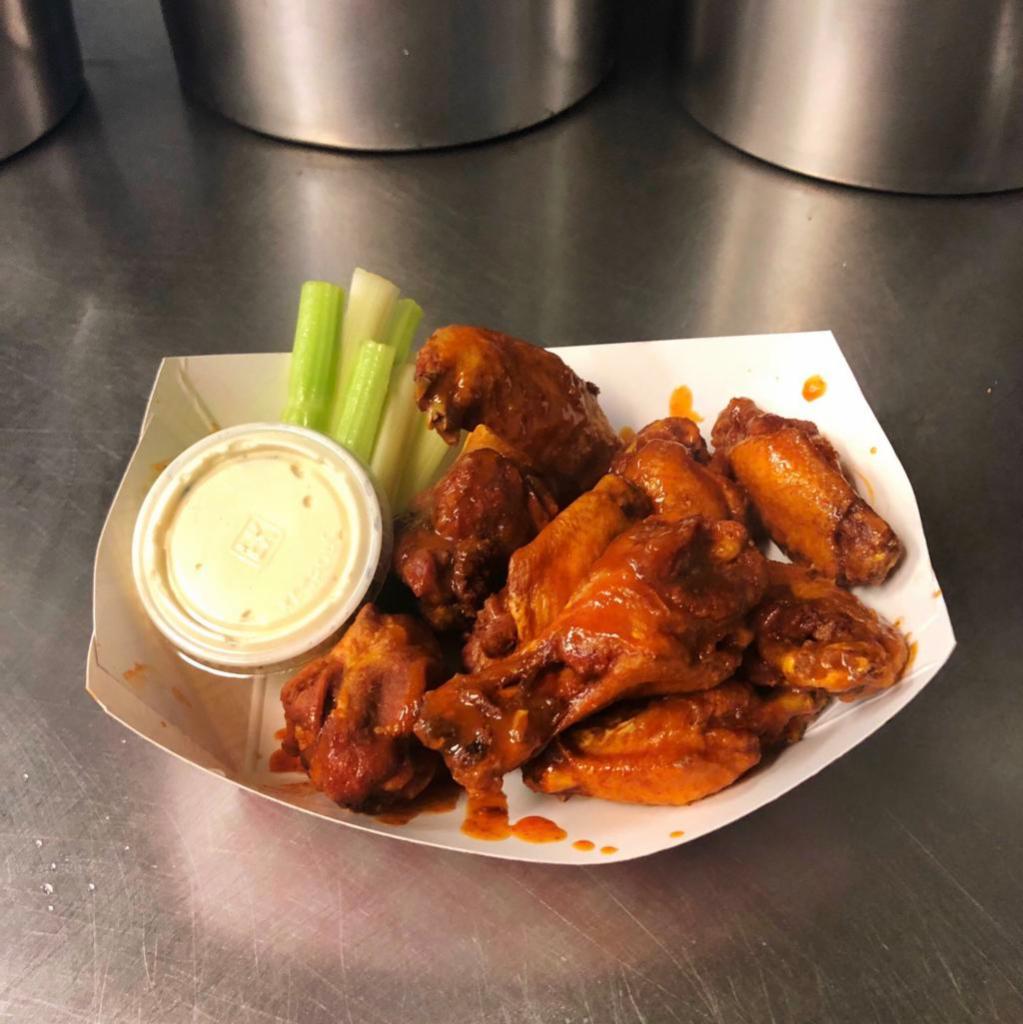 Chicken Wings (10) · Ten traditional bone-in chicken wings cooked to perfection then covered in your choice of our house made sauces.