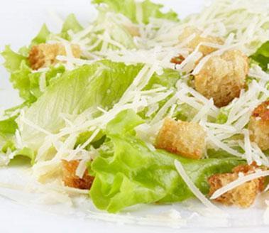 Chicken Caesar Salad · Our house made caesar salad served with fresh cut romaine then topped with grilled chicken, shredded asiago cheese and our house baked croutons with Ken's caesar dressing on the side.