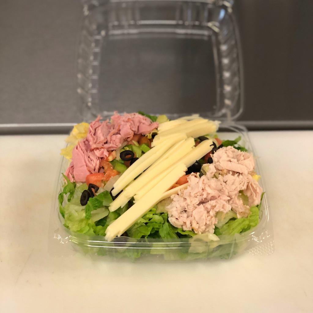 Chef Salad · Our house made chef salad with fresh cut romaine and iceberg mix topped with turkey, ham, provolone cheese, onions and olives. Served with your choice of dressing on the side.