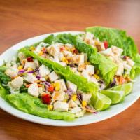 Chicken Lettuce Wraps · A crisp combination of grilled chicken, cabbage, carrots, bell peppers, tomatoes, red onion,...