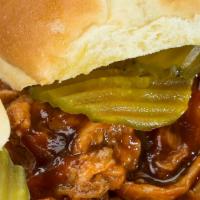 Individual BBQ Pork Slider · One warm shredded pork slider doused with our Honey BBQ sauce, topped with pickles and nestl...