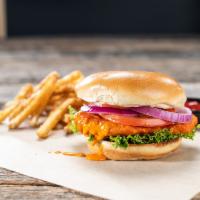 Buffalo Chicken Sandwich · Hand-battered crispy chicken breast tossed in our medium sauce, with lettuce, tomato, and re...
