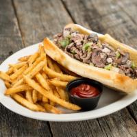 Philly Steak · Thinly sliced rib-eye steak grilled with onions, green bell peppers and red wine mushrooms. ...