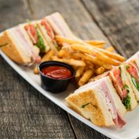 Club Sandwich · A traditional favorite with roasted turkey breast, smoked ham, hardwood smoked bacon, mozzar...