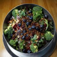 Shannie's Super Food Salad · Kale, Swiss chard, spinach, onions, broccoli, dried cranberries, blueberries, onions, toaste...