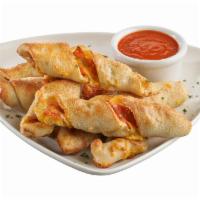 Pepperoni Stuffed Twist Bread · Our hand-pressed pizza dough stuffed with sliced pepperoni, cheddar, mozzarella and Parmesan...