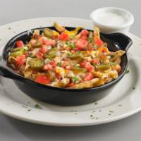 Loaded Cheese Fries · Fries smothered in our rich queso topped with fresh jalapeños, diced tomatoes, and bacon. Ga...