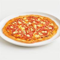 Pepperoni & Feta Thin Crust Pizza · Pepperoni pizza sprinkled with mozzarella and cheddar cheese and topped with feta.