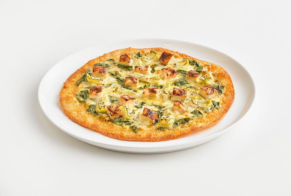 Chicken Spinach & Artichoke Thin Crust · Grilled chicken with our homemade spinach & artichoke mix smothered on top of a crispy thin crust. 