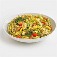 Veggie Pesto Pasta · Penne pasta mixed with an array of seasonal vegetables, tossed in pesto sauce. Topped with f...