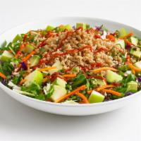 Quinoa Bowl · A quinoa rice blend on top of fresh spinach tossed in vinaigrette dressing with cabbage, shr...
