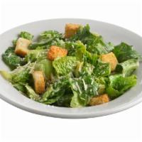 Caesar Starter Salad · A traditional Caesar with romaine lettuce, shredded Parmesan, Caesar dressing, and crunchy c...
