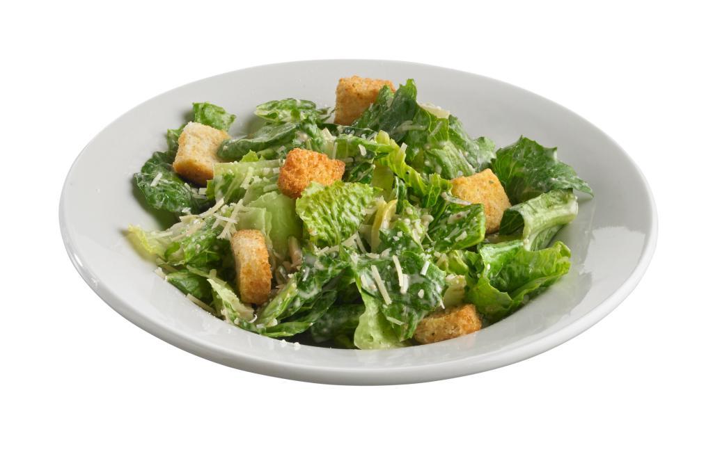 Caesar Starter Salad · A traditional Caesar with romaine lettuce, shredded Parmesan, Caesar dressing, and crunchy croutons.