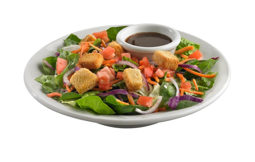 House Starter Salad · Spring mix with red onions, diced tomatoes, shredded carrots and savory croutons. Served with your choice of dressing. Vegetarian.