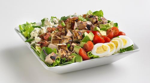 Chicken Cobb Entree Salad · Grilled chicken with fresh mixed greens, generously topped with avocado, bleu cheese, bacon, cherry tomatoes, sliced egg, and toasted pecans. Tossed in your choice of dressing.