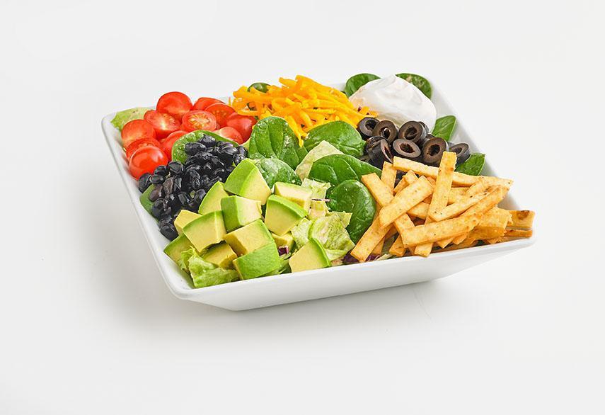 Santa Fe Entree Salad · Fresh mixed greens tossed with our Santa Fe ranch dressing. Topped with black beans, cherry tomatoes, cheddar cheese, black olives, sour cream, avocado, and tortilla strips.