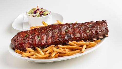Ribs · A full rack of All-American pork ribs smothered with barbecue sauce and slow roasted to perfection. Served with your choice of two sides.