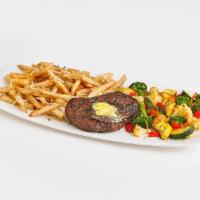 Steak Frites · 8oz. USDA Choice top sirloin grilled to perfection and topped with garlic butter. Served wit...
