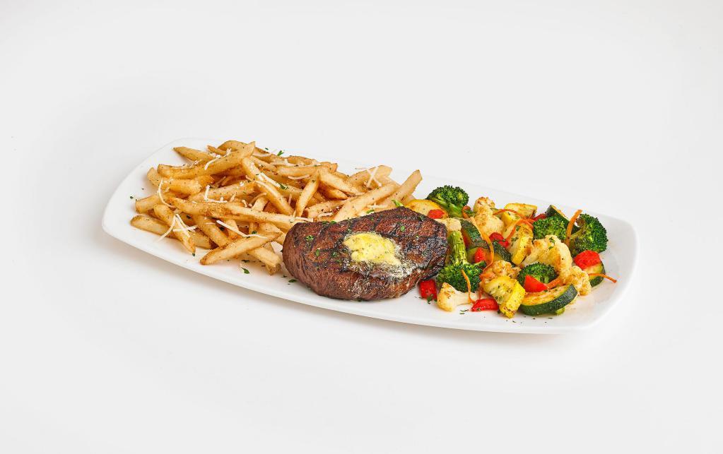 Steak Frites · 8oz. USDA Choice top sirloin grilled to perfection and topped with garlic butter. Served with roasted veggies and truffle Parmesan fries.